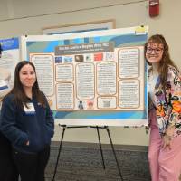 Della Chai, Mack Donohue, and Cass Lekas post by their poster presentation